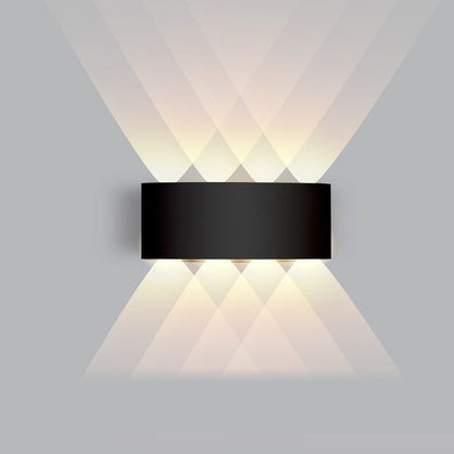 Applique nera 8 W, quattro fasci, bianco caldo