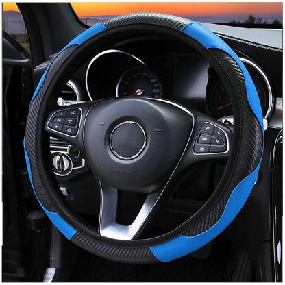 Coprivolante auto blu e nero, montato su un volante