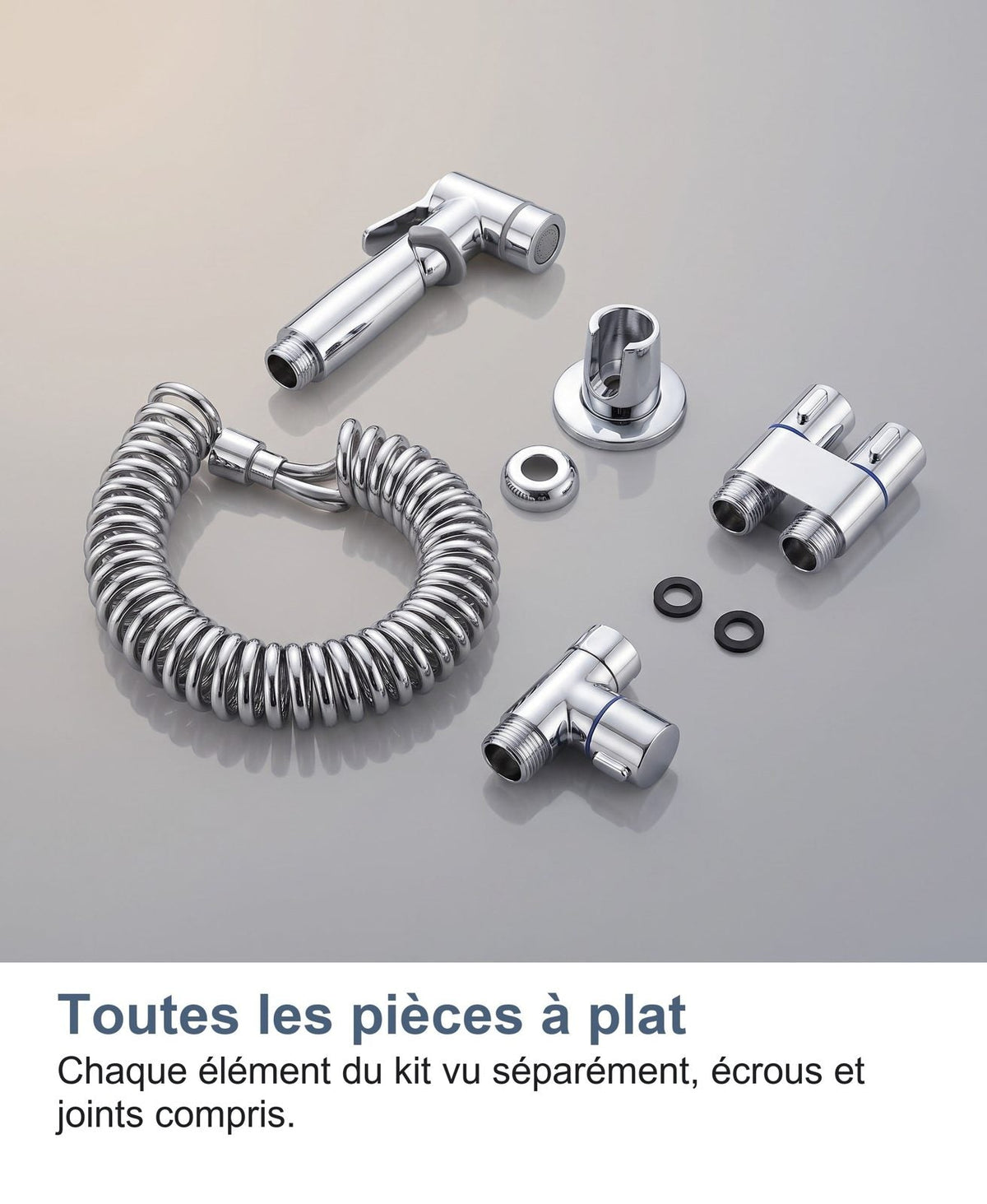 Tutti i pezzi del kit disposti in piano: pistola, flessibile, rubinetto, supporto e rosone