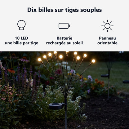 Dieci sfere luminose su steli flessibili